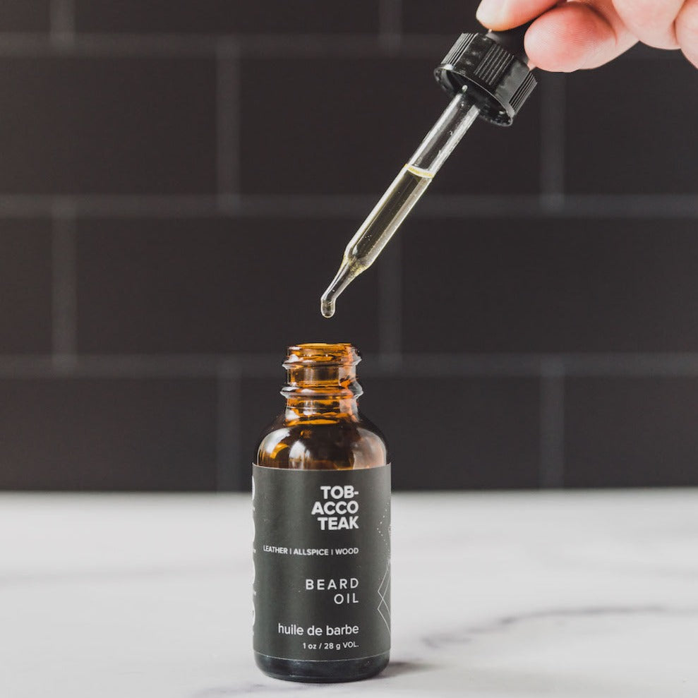Tobacco Teak beard oil and dropper on counter