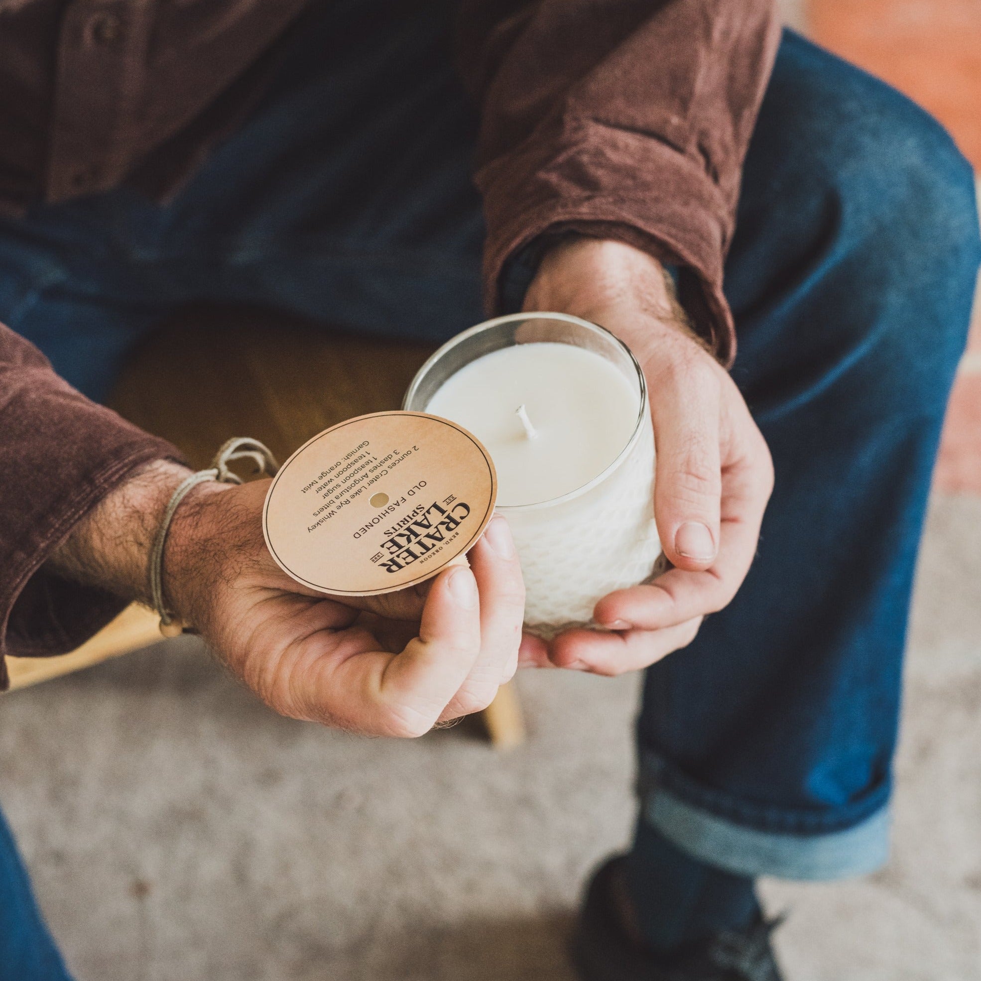 Moscow Mule 11oz candle being held by gentleman