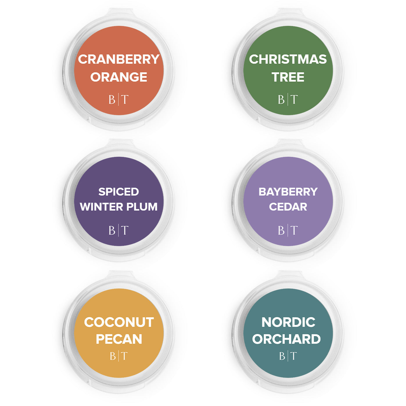 Cranberry Orange, Christmas Tree, Spiced Winter Plum, Bayberry Cedar, Coconut Pecan & Nordic Orchard Scent Samples on white background.