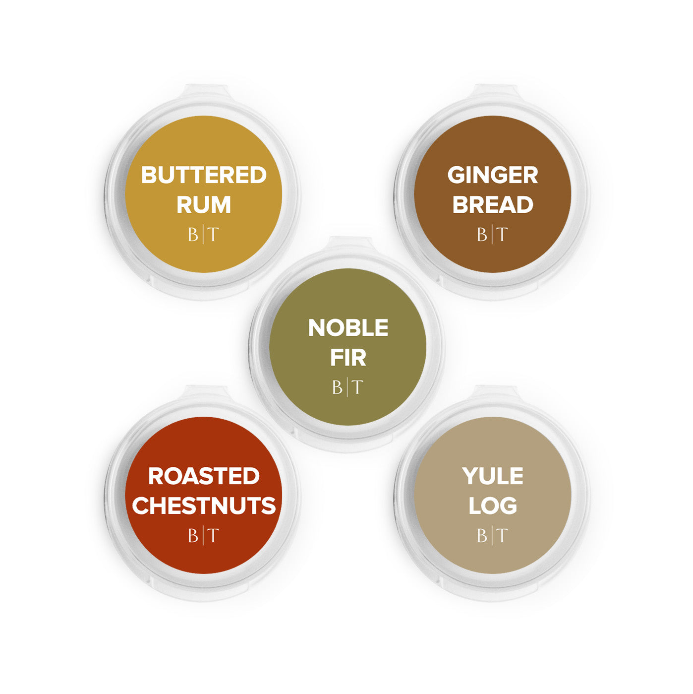 Buttered Rum, Gingerbread, Noble Fir, Roasted Chestnuts, and Yule Log Scent Samples on white background.