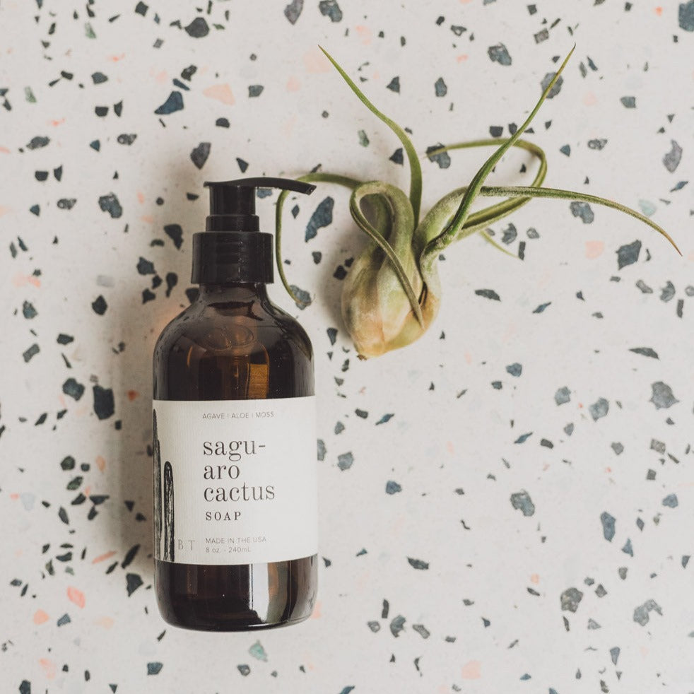 Saguaro Cactus 8oz liquid soap on black and white speckled counter