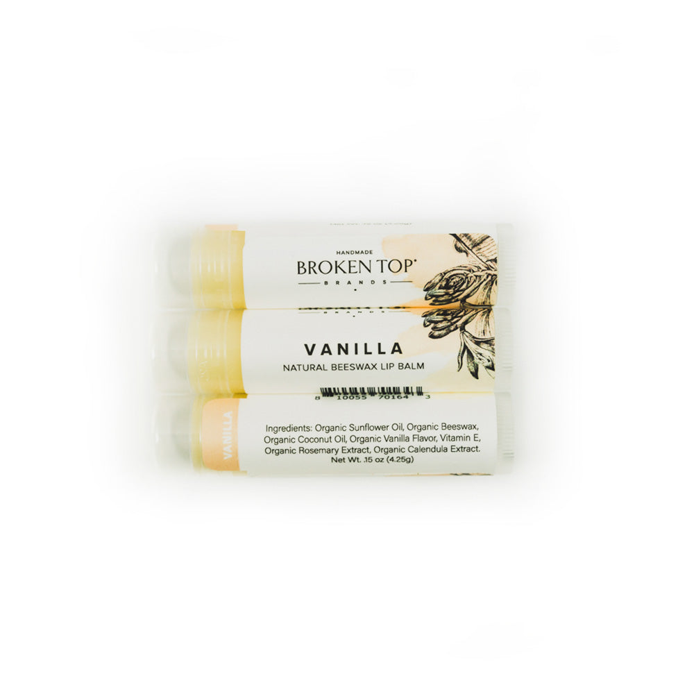 Three Vanilla lip balms on white background