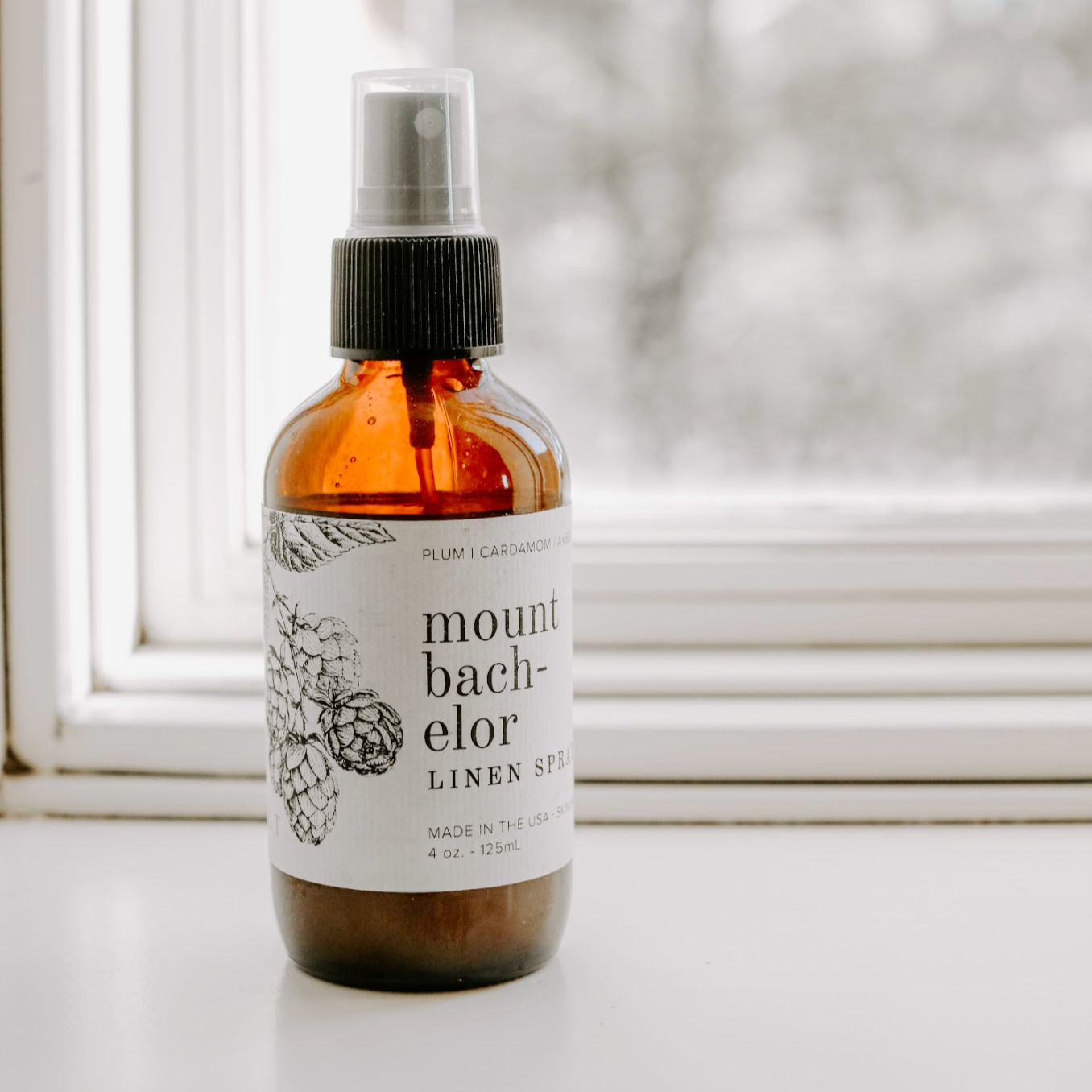 4oz Mount Bachelor linen spray on window seal