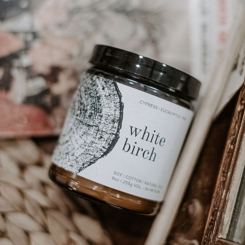 9oz White Birch candle on wood table