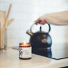 9oz Bayberry Cedar candle on a kitchen counter next to the stove