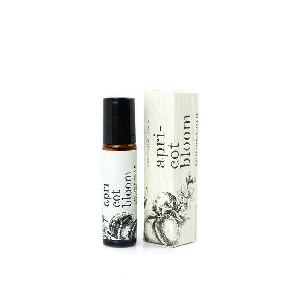 Apricot Bloom roll-on perfume with box on white background