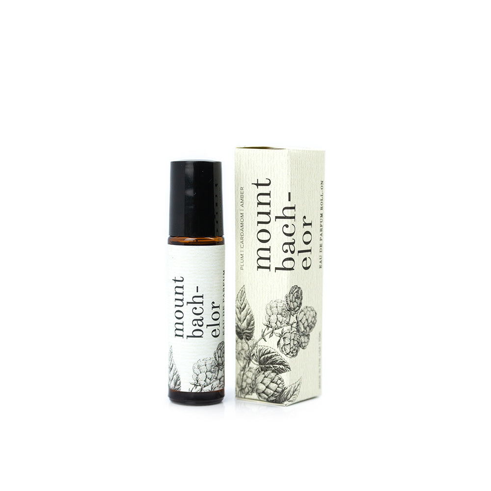 Mount Bachelor roll-on perfume with box on white background