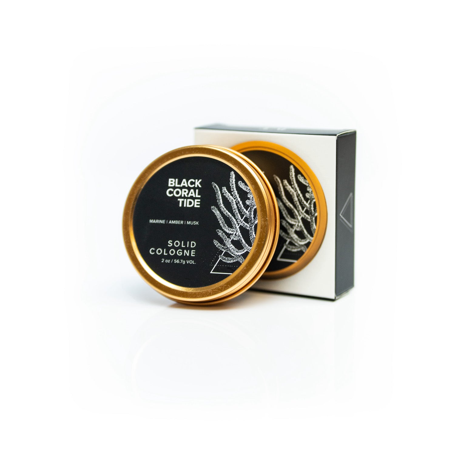 Black Coral Tide solid cologne on white background