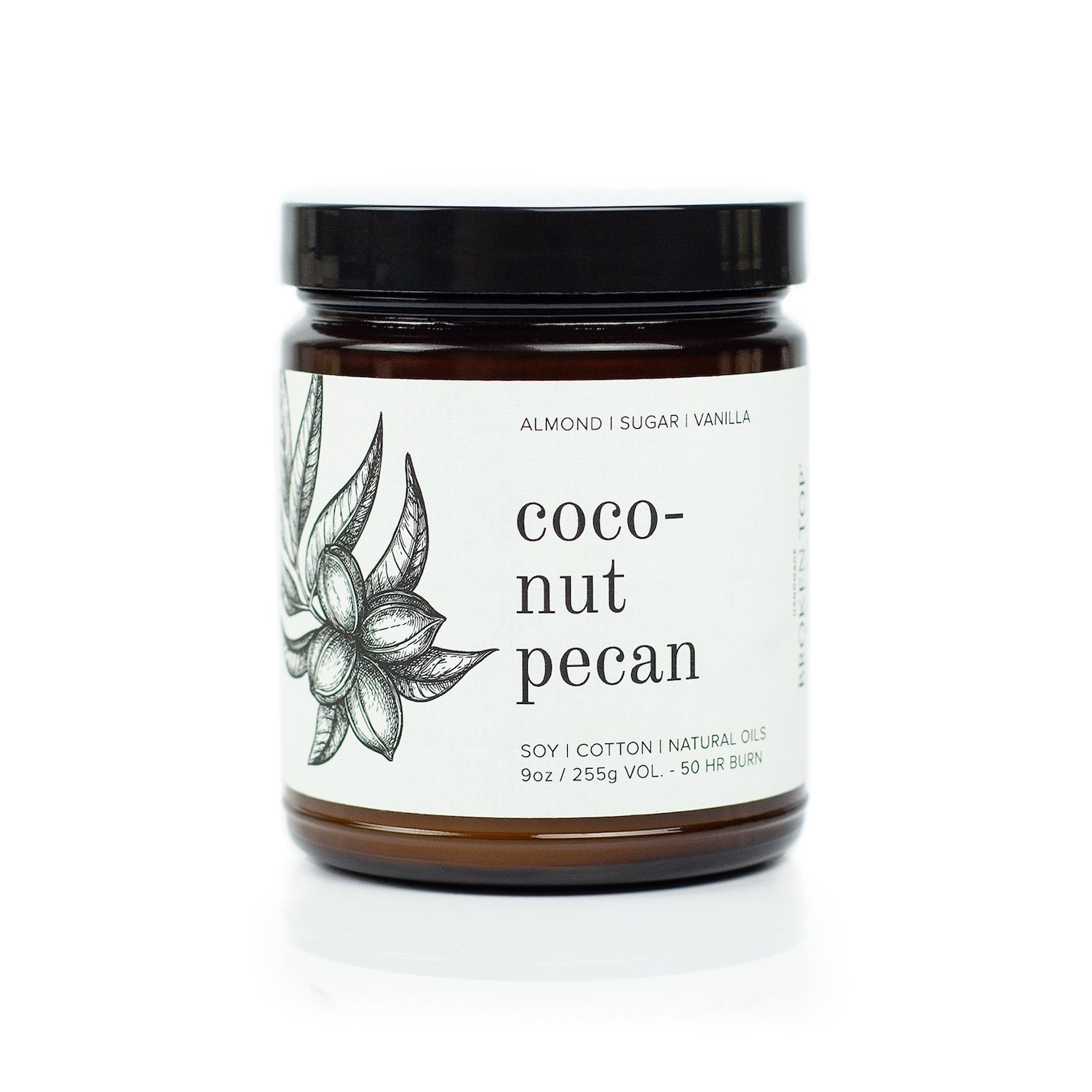 9oz Coconut Pecan Soy Candle on white background. 
