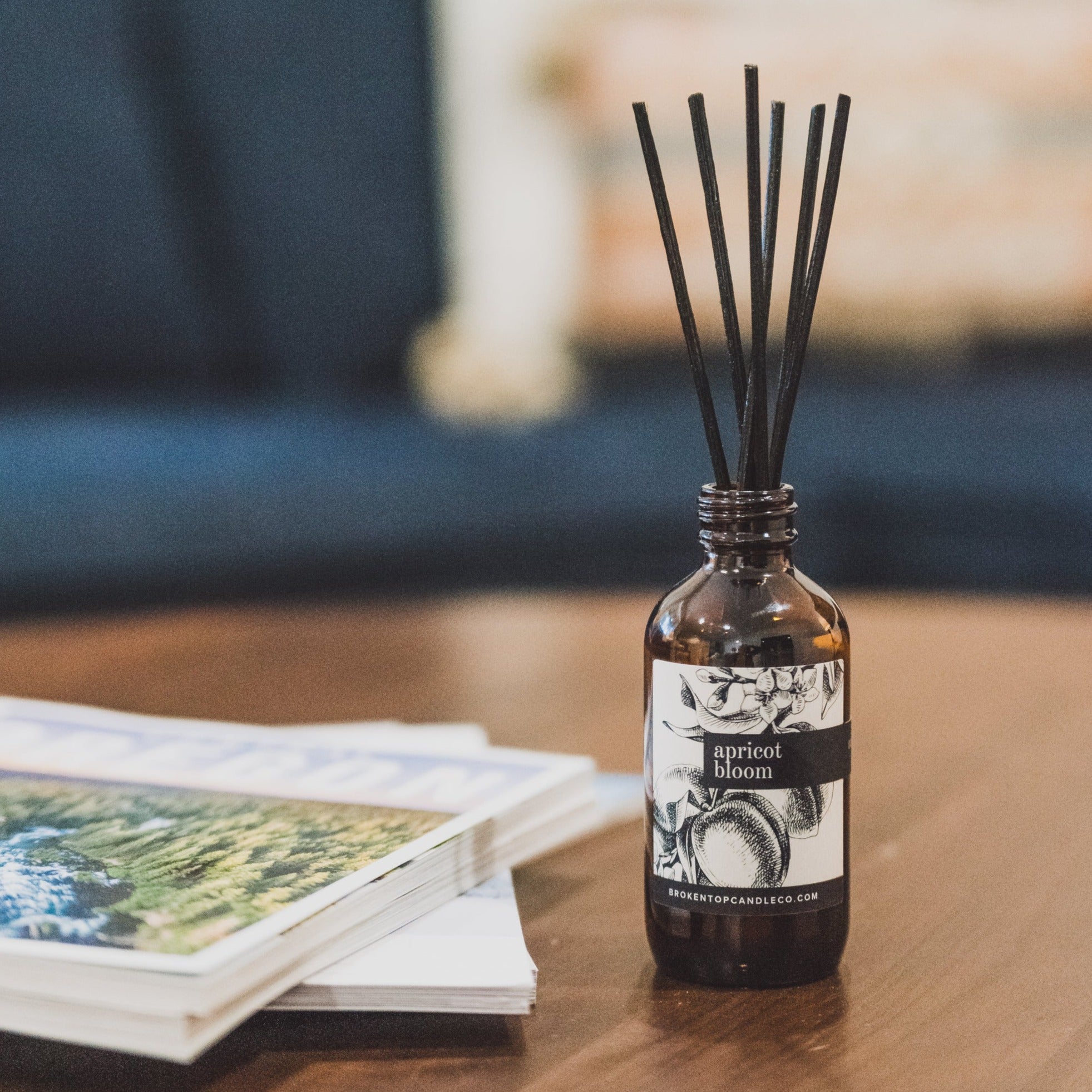 Apricot Bloom Reed diffuser on wood table