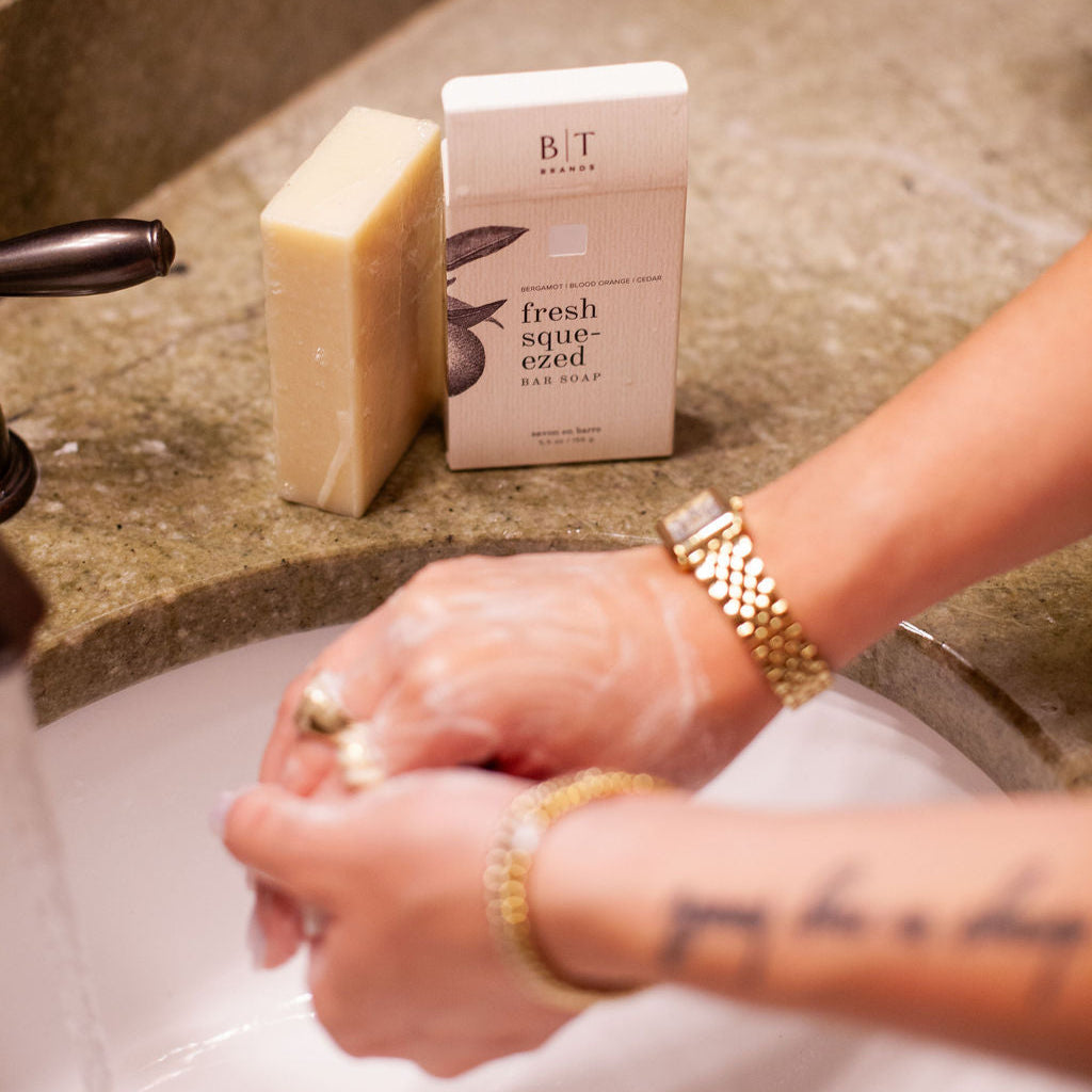 Fresh Squeezed Bar Soap being used in a bathroom sink. 