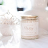 9oz 'Its Giving Wifey' Soy Candle on white table next to white veil and tiara