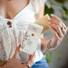 Lavender Mint Bar Soap being unboxed by woman's hands. 