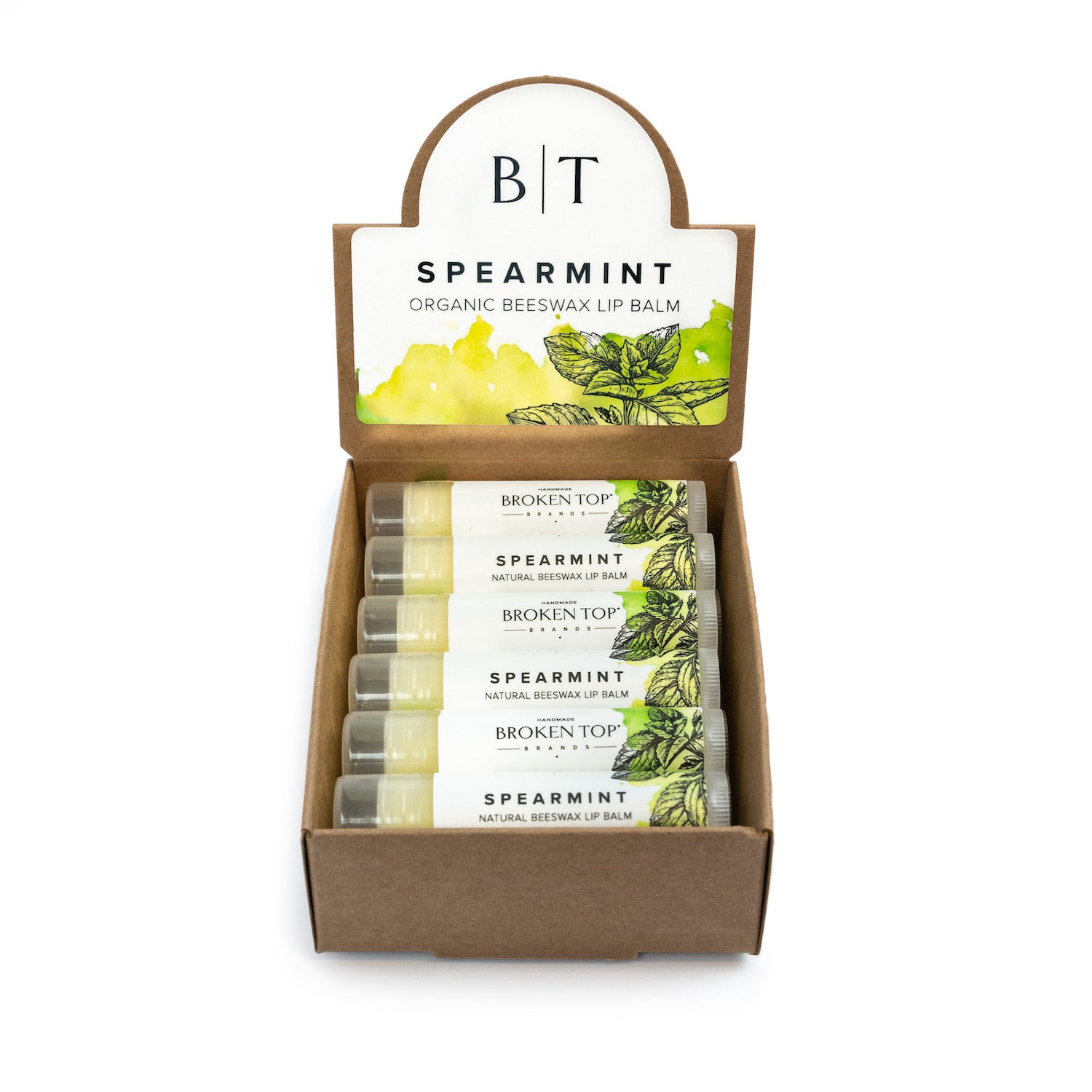 Box of spearmint lip balms with Broken Top branding on a white background.
