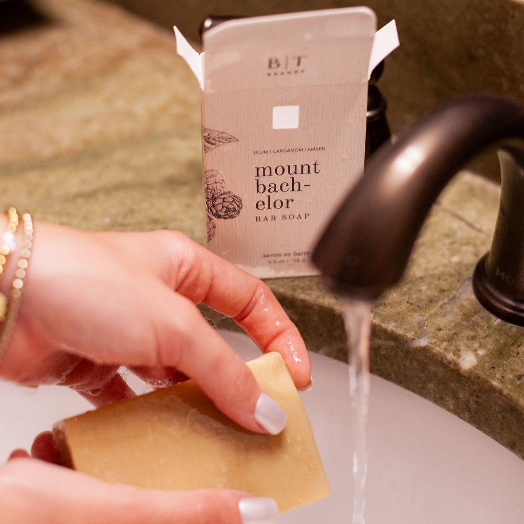 Mount Bachelor Bar Soap being used in bathroom sink. 