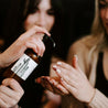 Saguaro Cactus 8oz lotion being dispensed into women's hands